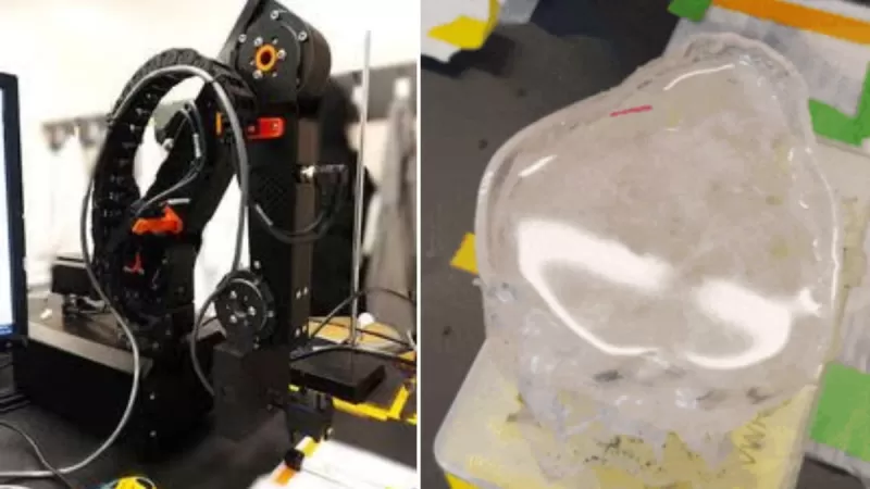 Исследователи ведут миниатюрного робота (розовый) по 3D-модели мочевыводящих путей, используя вращающийся магнит на роботизированном манипуляторе