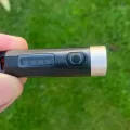 Фонарик Philips SFL1121 в руке для сравнения размеров